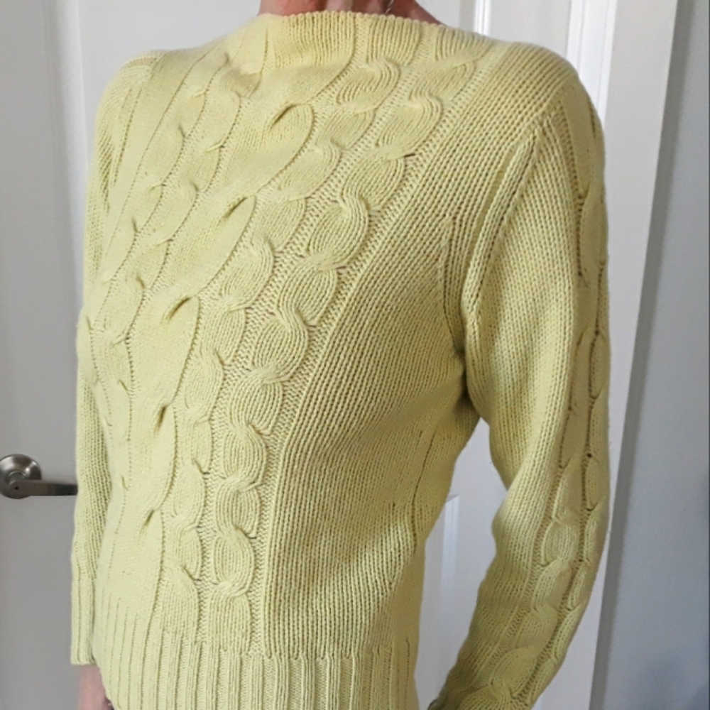 A vintage Neiman Marcus mint colored cashmere sweater